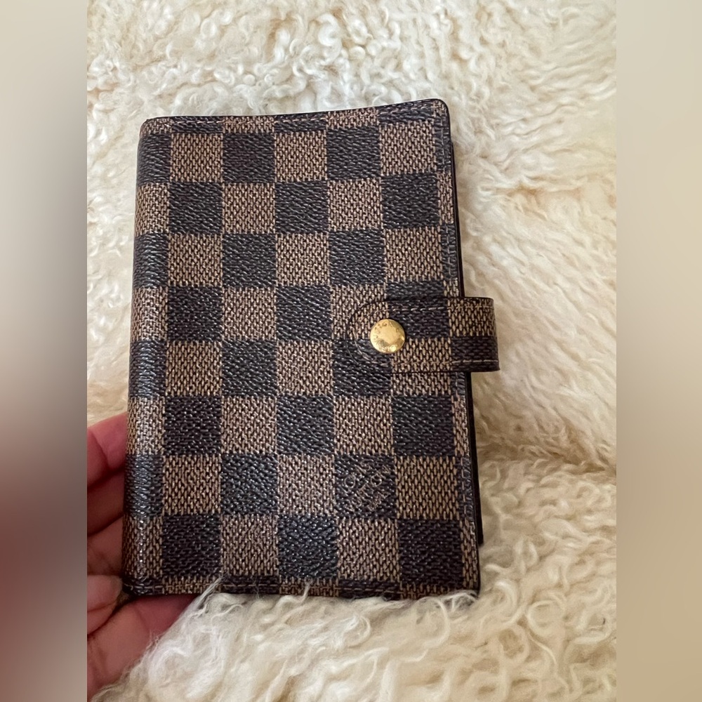 Louis Vuitton Damier Ebene Agenda PM in coated canvas.